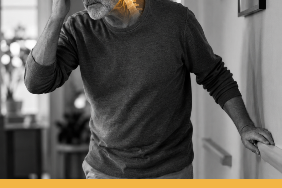 Uomo adulto che si stabilizza con una mano al corrimano e l’altra alla tempia, con evidenziazione dorata localizzata tra orecchio e tratto cervicale superiore.